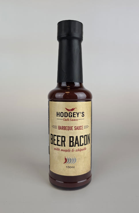 A bottle of Hodgey's Beer Bacon Barbeque Chilli Sauce